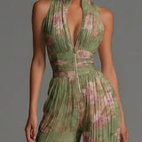 Amelia – plisseret grøn jumpsuit med blomsterprint
