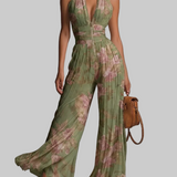 Amelia – plisseret grøn jumpsuit med blomsterprint